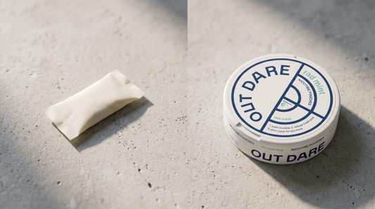 Unwrapped nicotine gum and an OutDare pouch can compared side by side on a pale worktop