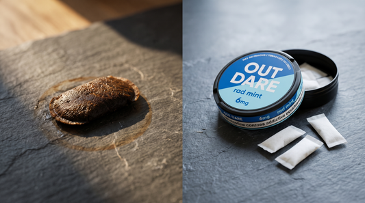 Dark brown snus portion beside an open nicotine pouch can on a honed slate worktop