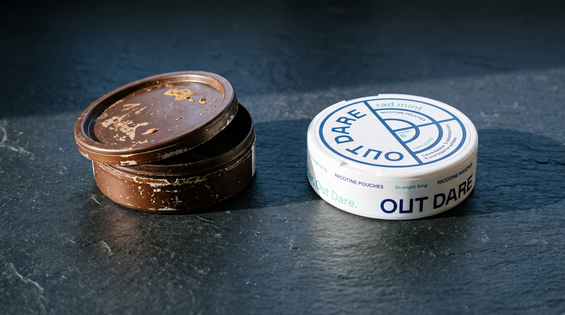 Battered brown snus can and a clean flat nicotine pouch can side by side on dark slate