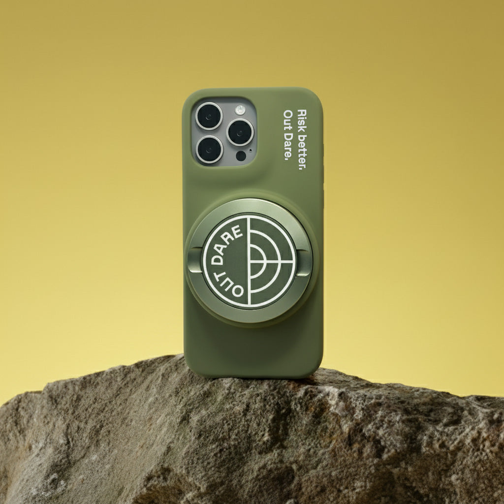 OutDare iPhone 16 Pro Max case in green with the grip, on a rock