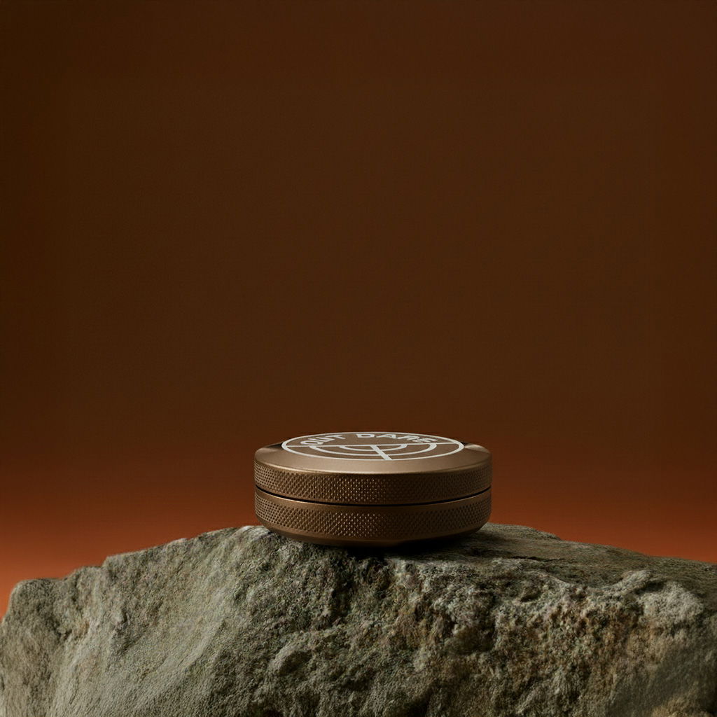 Brown OutDare metal can lying flat on a rock